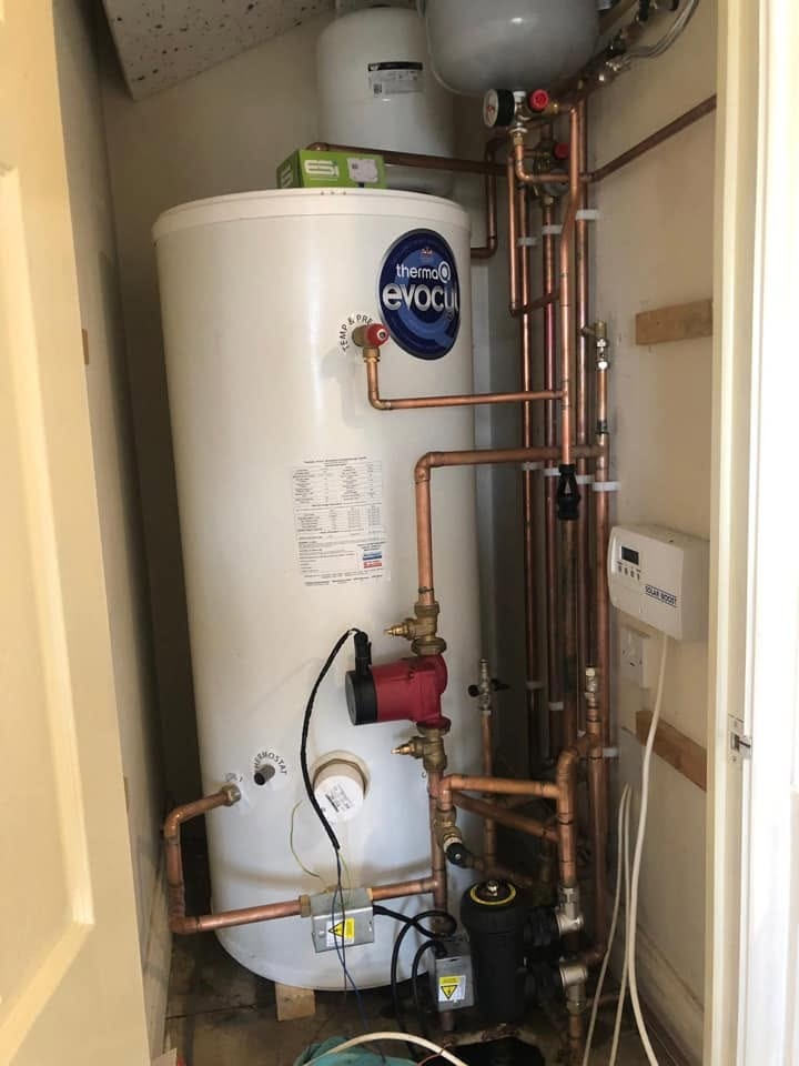 New unvented hot water cylinder installation completed with copper pipework